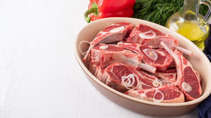 Wall Mural - Fresh raw mutton on the bone with ingredients for marinate. Copyspace