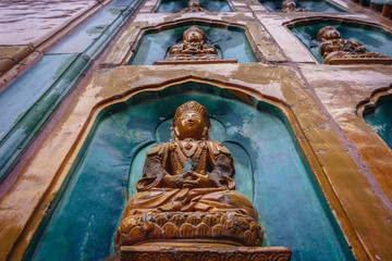 Sticker - Tile with Buddha on a facade of Sea of Wisdom Hall located on Longevity Hill in Summer Palace in Beijing, capital city of China