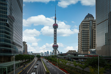 Wall Mural - Shanghai city and tower with a road and building