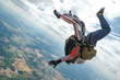 © vladimirzhoga - Skydiving tandem in a free fall