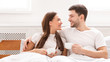 © Prostock-studio - Loving Boyfriend And Girlfriend Having Coffee Lying In Bed, Panorama