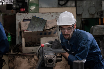 worker with grinder