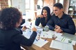 © Krakenimages.com - Young beautiful couple applying for mortgage. Sitting smiling happy meeting with real state agent considering mortgage loan at bank