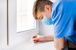 © Sabphoto - Young Man with a Thermometer