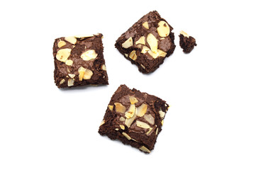 Sticker - Chocolate brownie with sliced almond nuts toppings isolated on white background.