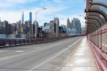 Wall Mural - Empty Bridge with a Pedestrian Path leading to Roosevelt Island in New York City