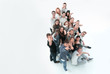 © ASDF - top view. group of diverse youth pointing at the camera