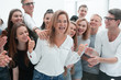 © ASDF - group of young people supporting their happy leader
