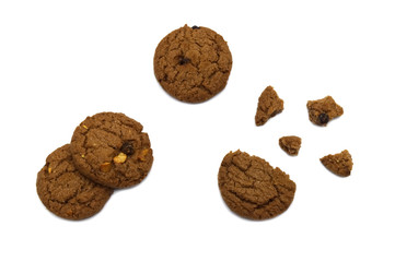 Biscuit with chocolate chip flavored. Some broken and crumbs of crunchy delicious sweet meal and useful cookie with isolated on white background.