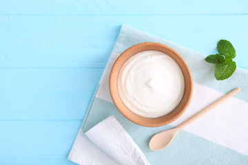 Wall Mural - Natural white yogurt on the table. Healthy snack, Greek yogurt.