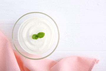 Wall Mural - Natural white yogurt on the table. Healthy snack, Greek yogurt.