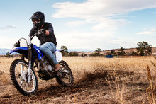 Young Man Dirt Biking In The Foothills In Colorado