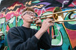 © Hill Street Studios - High school jazz band trombone player by colorful graffiti