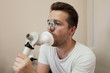 © RealPeopleStudio - Young man testing breathing function by spirometry