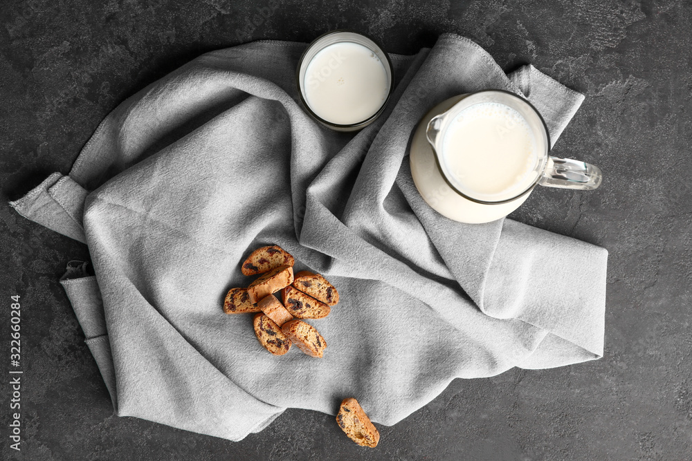 Sweet cookies and milk on table