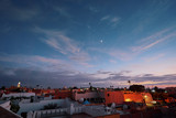 Fototapeta Do pokoju - Arabian night. Rooftops city view in Marrakech.