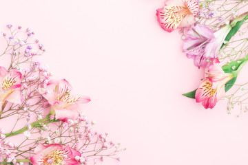 Floral composition. FLowers border frame with  gypsophila and alstroemeria. Flat lay, top view, copy space, mock up.