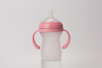 A big milk bottle. Against a white background