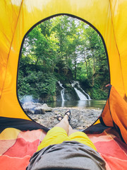 Wall Mural - view from tent to the waterfall