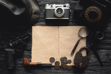 Wall Mural - detective book on the detective agent desk flat lay background.