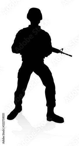 Silhouettes of a military a...