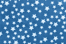 Classic Blue Stars On Black Canvas Cotton Texture. Dark Colored Fabric Background