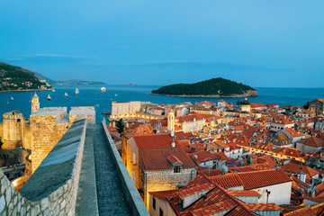 Wall Mural - Dubrovnik old city Lokrum Island and Adriatic sea at dusk