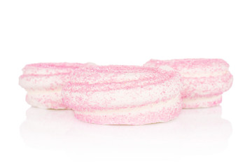 Group of three whole pink sweet meringue isolated on white background