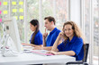 © eakgrungenerd - Team call center worker and operators with microphone and computer at work, Call center, support telemarketing.