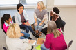 © Chris Ryan/Caia Image - Women's support group talking in circle