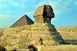 Sphinx is sitting in the desert for ages looks like camel with pyramid on back
