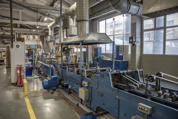 Industrial workshop of the Lambumiz plant. Production of laminated cardboard food packaging. Moscow, Russia