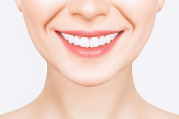 Perfect healthy teeth smile of a young woman. Teeth whitening. Dental clinic patient. Image symbolizes oral care dentistry, stomatology. Dentistry image.