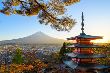 view of red pagoda chureito and mount fuji at sunset