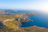 Fototapeta  - Aerial view of the rocky coast stretching into the distance.