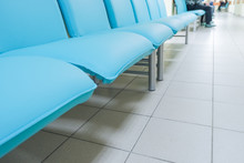 Hall Of Expectation In A Public Building. Interior Reception Room In A Medical Clinic.interior Of A Public Organization.Comfortable Soft Blue Chairs At The Reception. Chairs For Waiting. Seats For