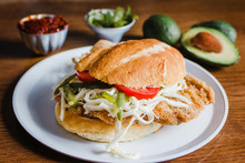 Mexican Torta Is Chicken Milanese Sandwich With Avocado, Chili Chipotle And Oaxaca Cheese