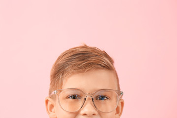 Sticker - Cute little boy with eyeglasses on color background