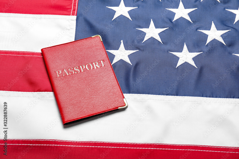 Passport on USA flag. Immigration concept