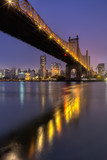 Fototapeta Miasto - View on Queensboro bridge and Midtown During sunrise from East river with long exposure