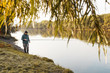 © ProstoSvet - A man is fishing on the river. Fisherman on a morning fishing trip
