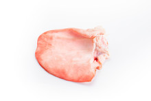 Raw Pig Ear Isolated On A White Background.