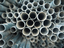 Close up EMT steel conduit pipes bundles