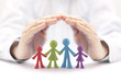 © Jakub Krechowicz - Family insurance concept with colorful family figurines covered by hands