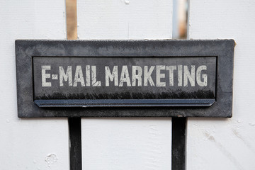 Wall Mural - E-MAIL MARKETING CONCEPT.  Mailbox and white fence