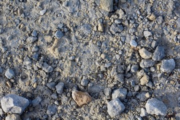 A close view of the rock and pebble ground surface.