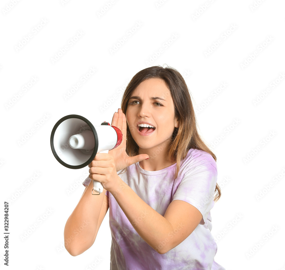 Emotional young woman with megaphone on white background