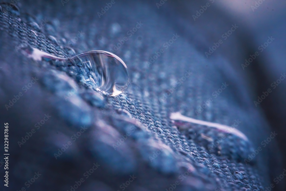 Water drops on impregnated waterproof fabric. - obrazy, fototapety, plakaty 