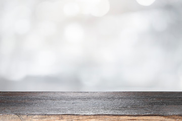 empty wooden table for present product on white bokeh blur background.