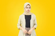 © Khoirul - Portrait of Asian women with sad face on yellow background